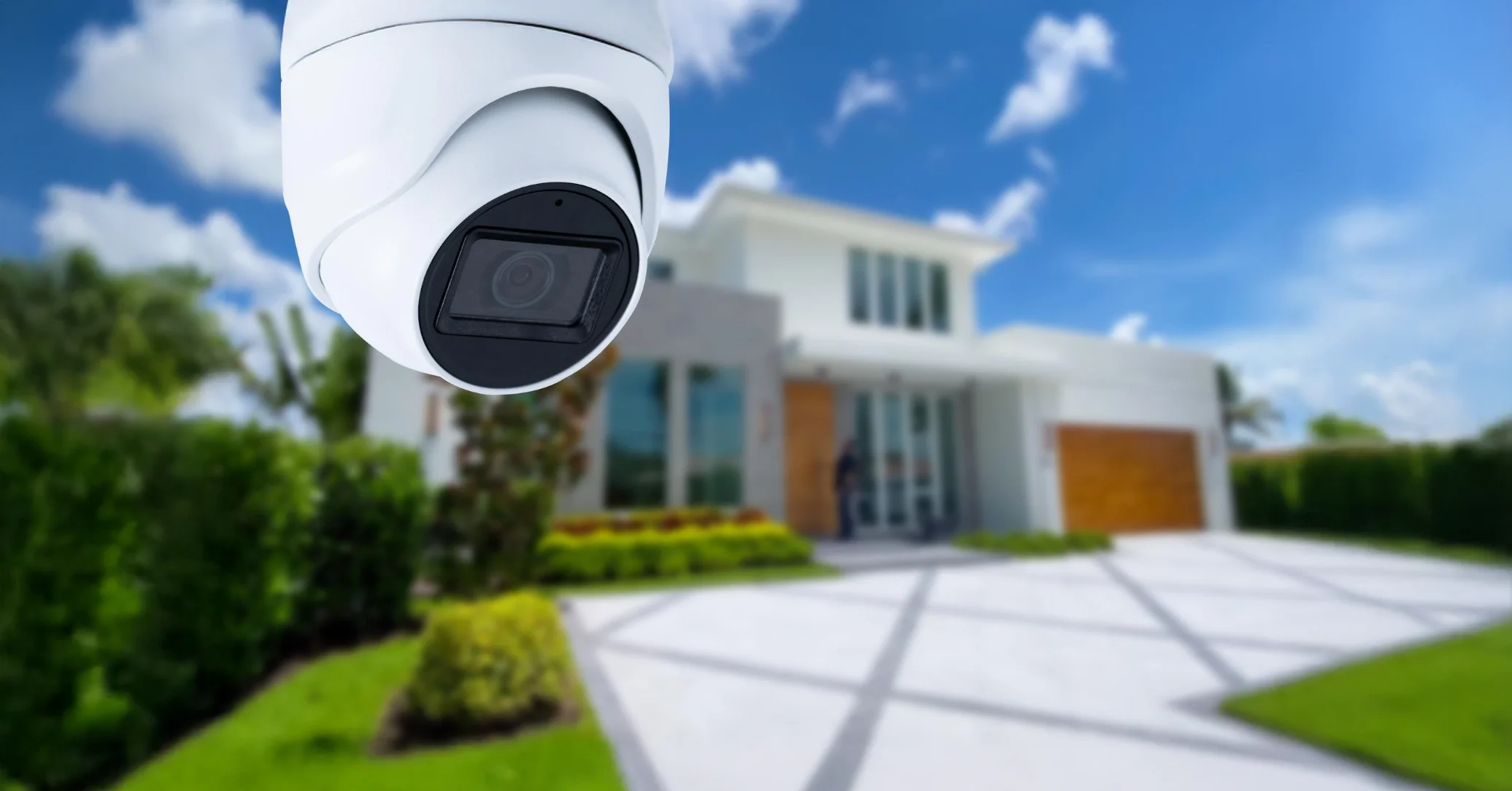 Security camera monitoring a modern house
