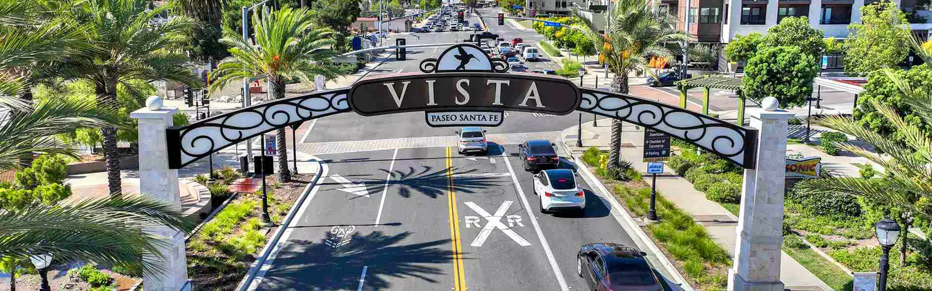 Vista entrance archway with busy street view