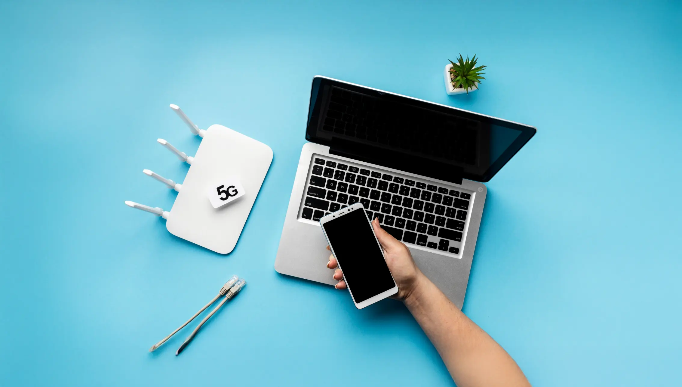 Smartphone and laptop with 5G router setup