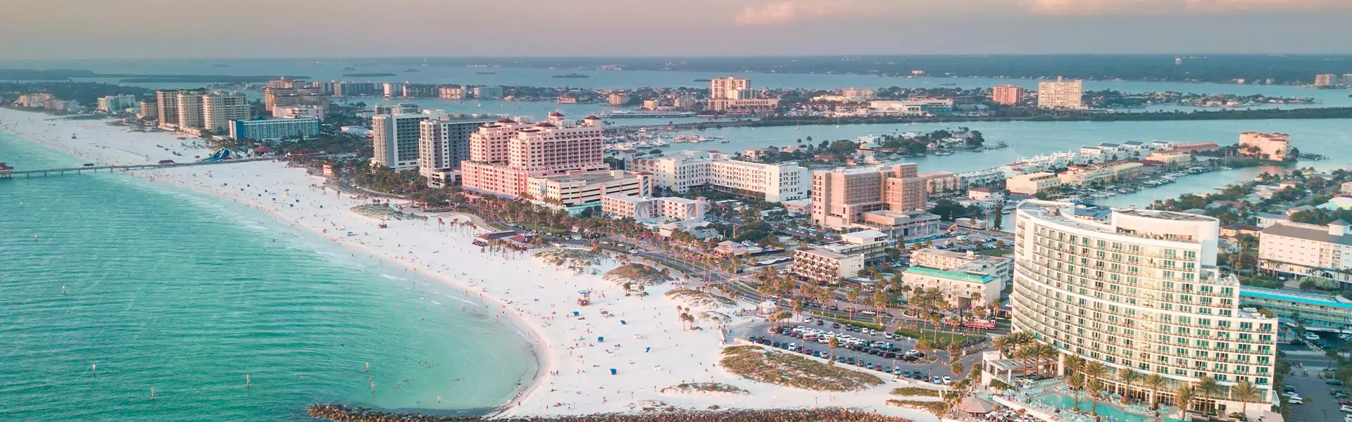 Aerial view of Clearwater Beach with hotels and ocean.