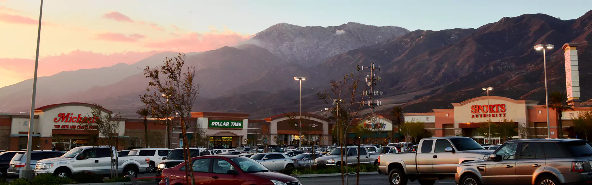 Shopping center with mountains in the background.
