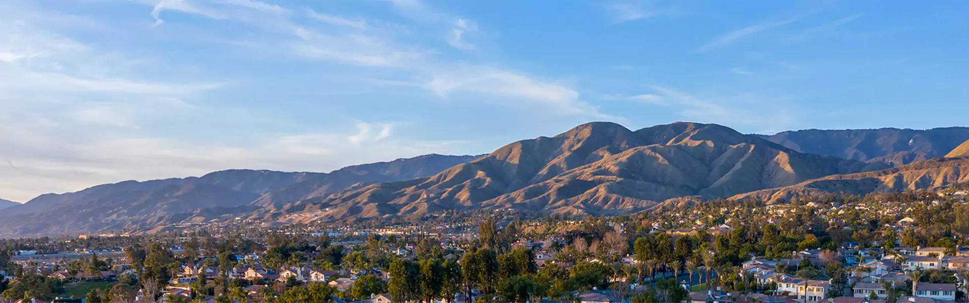 Panoramic view of mountains and valleys.