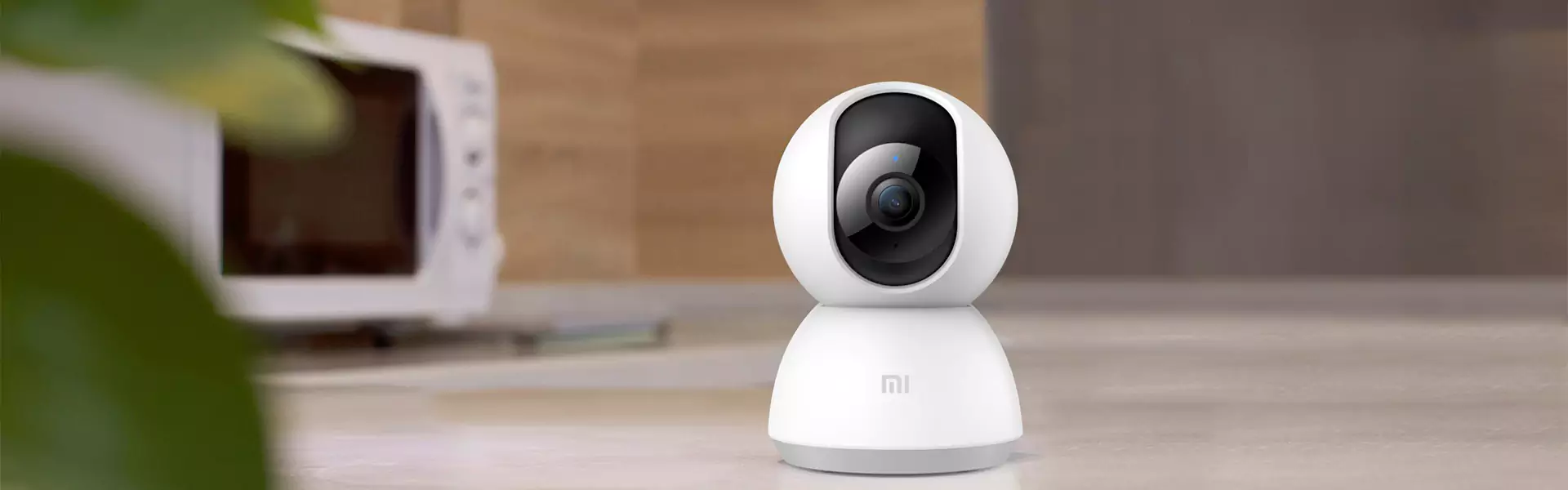 White smart camera on a kitchen countertop.