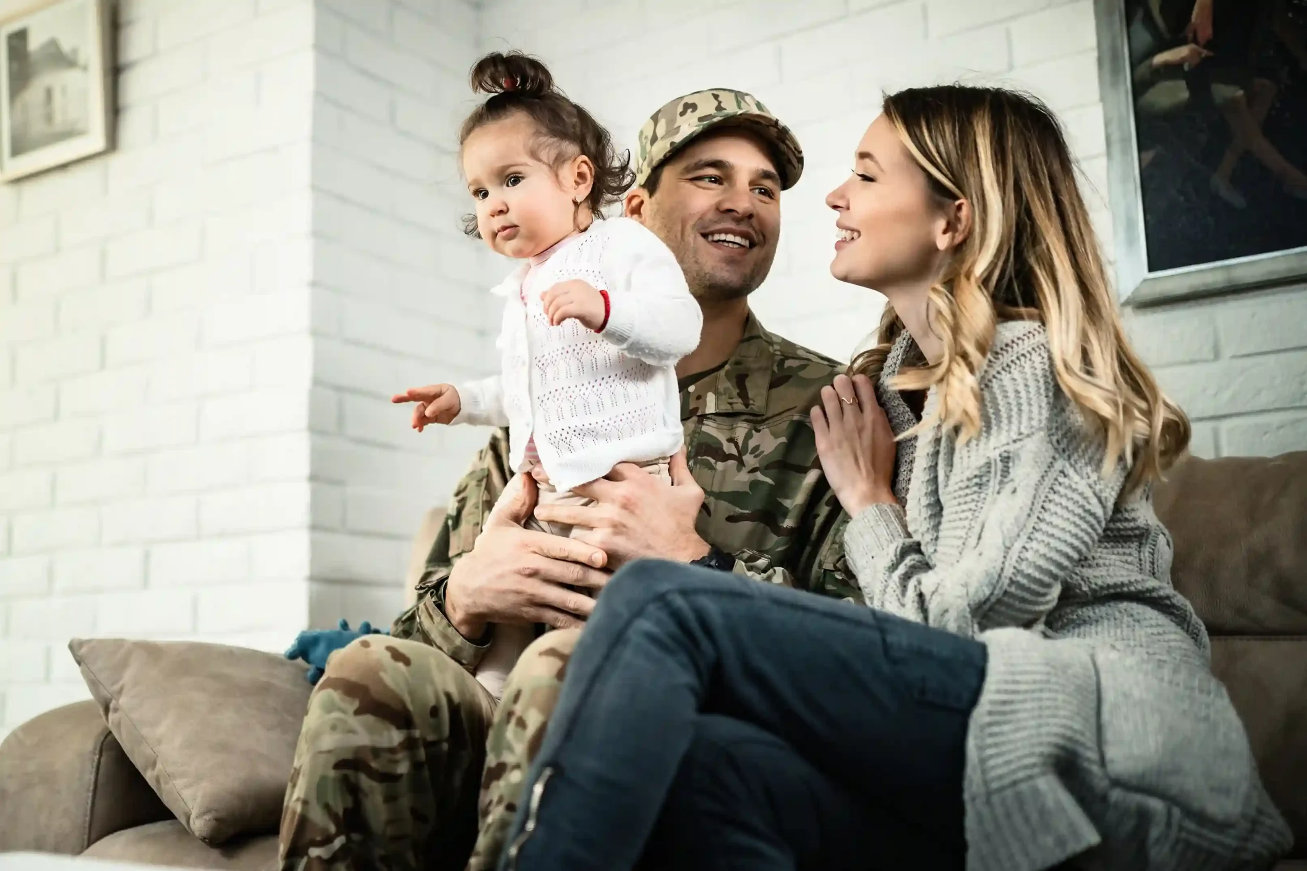 Family bonding time with a soldier and child.