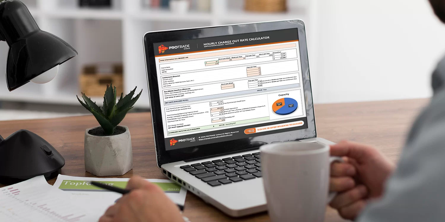 someone with calculator, looking at bills, etc.