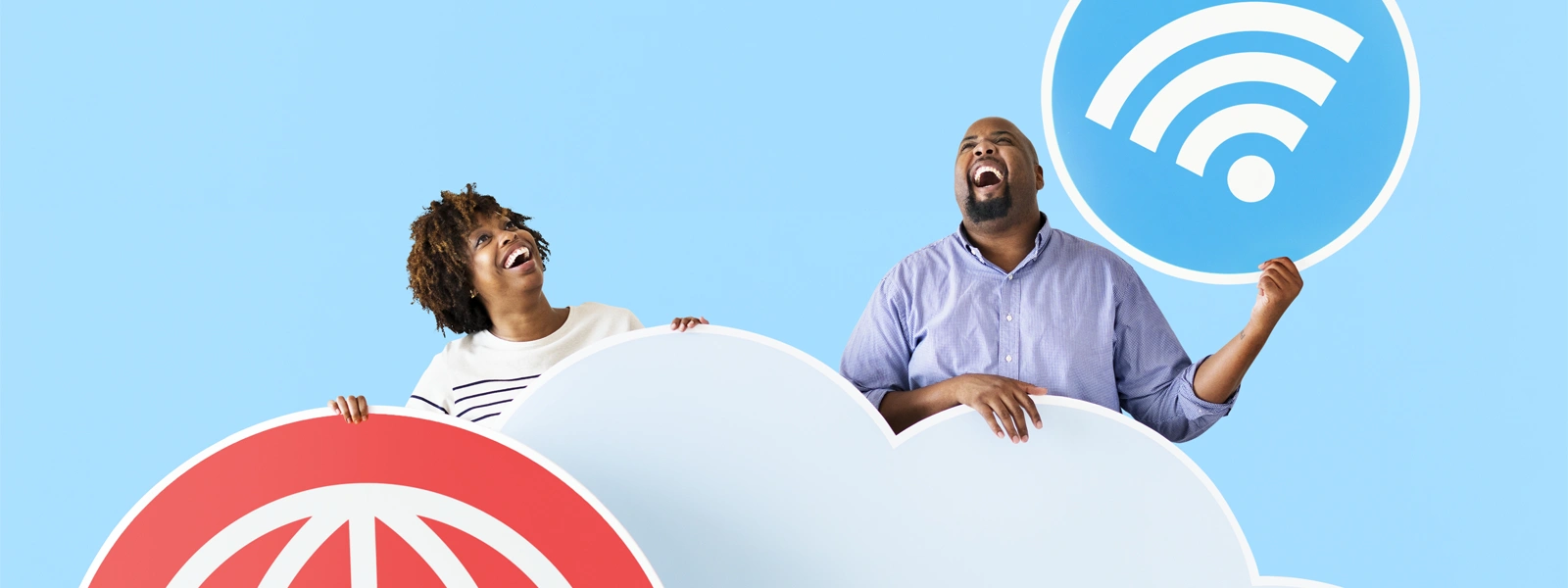 Two people joyfully holding large cloud symbols