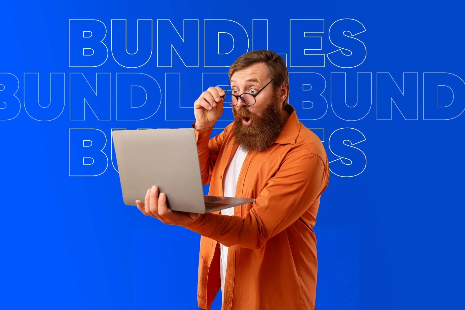 Surprised man with laptop on a blue background.